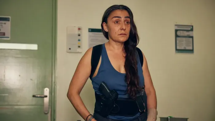 The Marked Woman: Candela Peña stands with arms by sides.