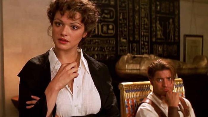 The Mummy Movie: Evie and Rick talk pensively toward a third party (off-screen)