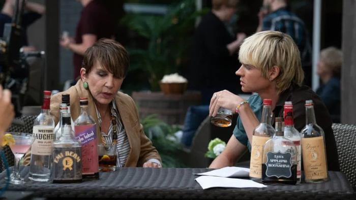 The Nana Project: An older woman with short brown hair and a young man with shaggy blond hair sit and talk 