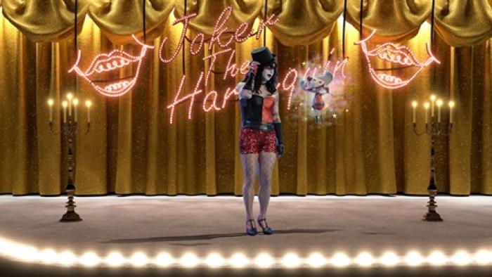 The People's Joker Movie: Vera Drew and Mx. Mxyzpltk are on a gold-curtained stage