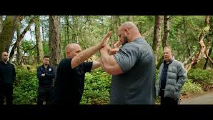 The Power of Chi: a smaller man tips a large man off balance