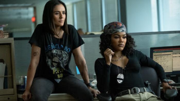 The Rip: Teyana Taylor and Catalina Sandino Moreno sit in an office.