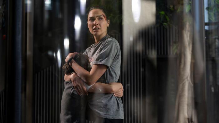 The Runner: Gal Gadot hugs Rory Wilmot.
