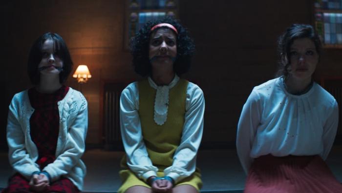 The Sacrifice Game movie: 3 young women have mouths and hands bound as they look scared