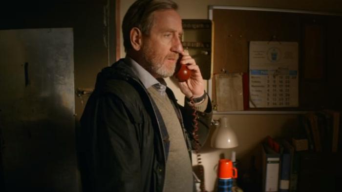 Tollbooth Scene #1: Michael Smiley on phone