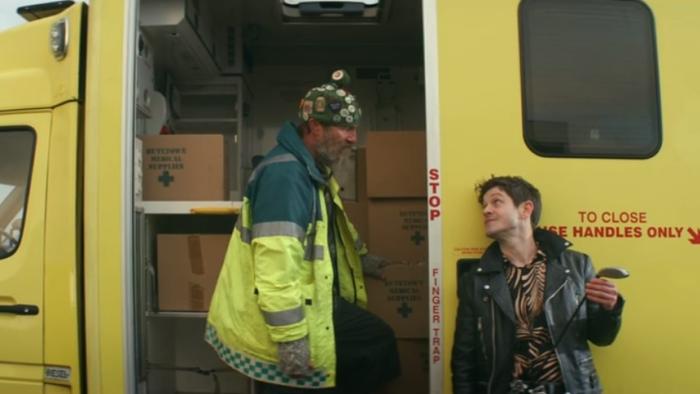 Tollbooth Scene #3: Paul Kaye and Iwan Rheon stand by ambulance and talk