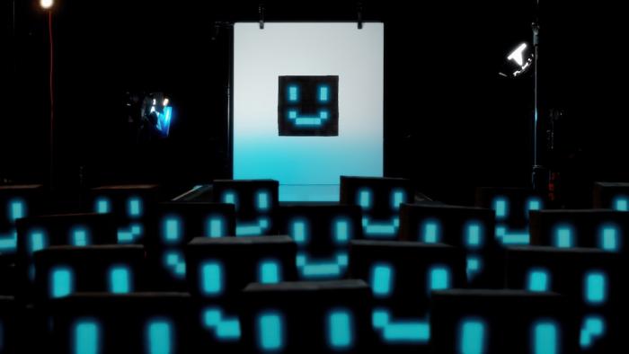 The AI Doc: Or How I Became an Apocaloptimist Movie: An infographic demonstrates AI as a room full of smiley-faced chips