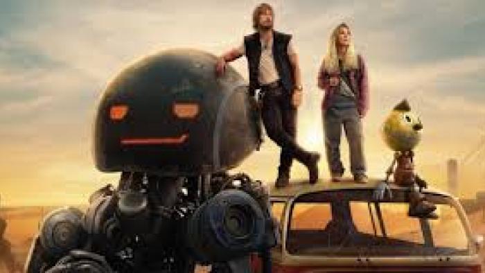 The Electric State: Characters stand on top of van