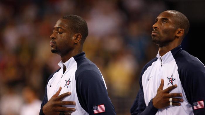The Redeem Team members Dwyane Wade (left) and Kobe Bryant (right) in a Pledge of Alliance stance.