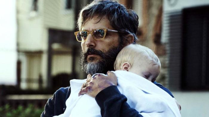 The Son Movie: Lorenzo holds the baby