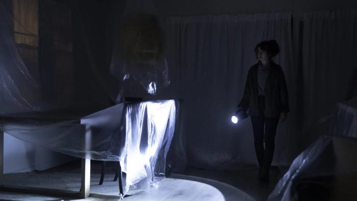 The Unheard: Chloe enters an empty room. 