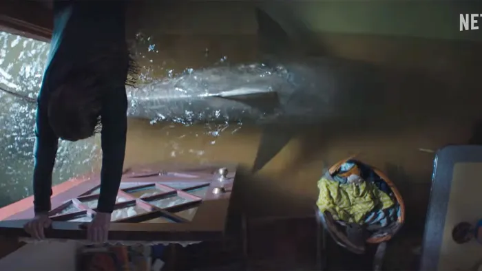 Thrash: Sharks entering a flooded house.