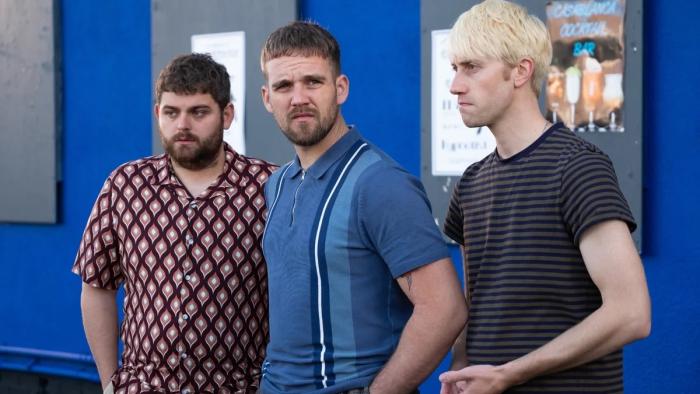 Three Day Millionaire: Three young White men stand in a line