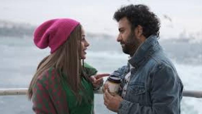 Too Much Love: woman and man outside