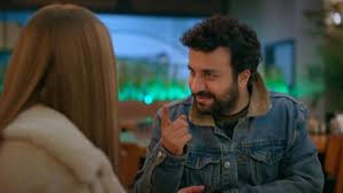 Too Much Love: Man talks to blonde woman
