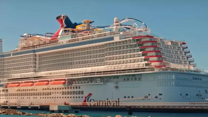 Trainwreck: Poop Cruise movie: The Carnival cruise ship, the Triumph, is docked in the daytime