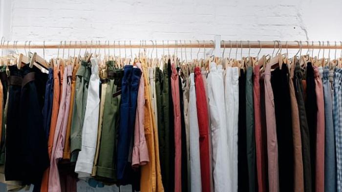 Trainwreck: The Cult of American Apparel movie: Dozens of American Apparel clothing items hang on a rack