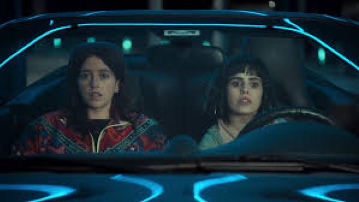 (Un)lucky Sisters:  two women in a car