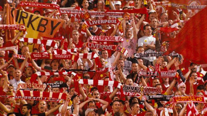 Untold UK -- Liverpool's Miracle of Istanbul: Soccer fans in a stadium hold flags and scarves