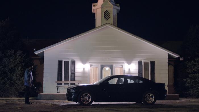What Remains Movie: Pastor and car in front of church