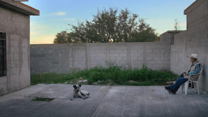 Julían Moreno and his pet dog Pinto.