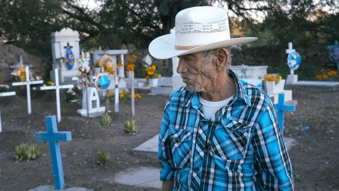 Julían Moreno visits the gravesite of his wife Lidia Calderón.