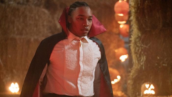 Whistle Movie: Dean (Jhaleil Swaby), dressed as a vampire for the harvest festival, looks stunned by something