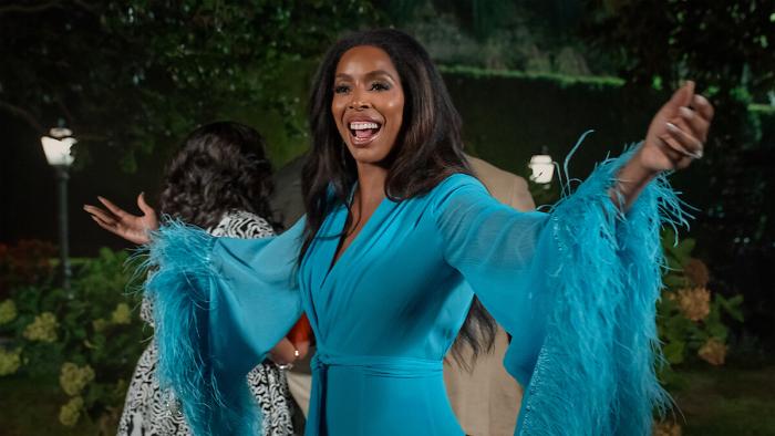 Why Did I Get Married Again?: Tasha Smith in a blue dress.
