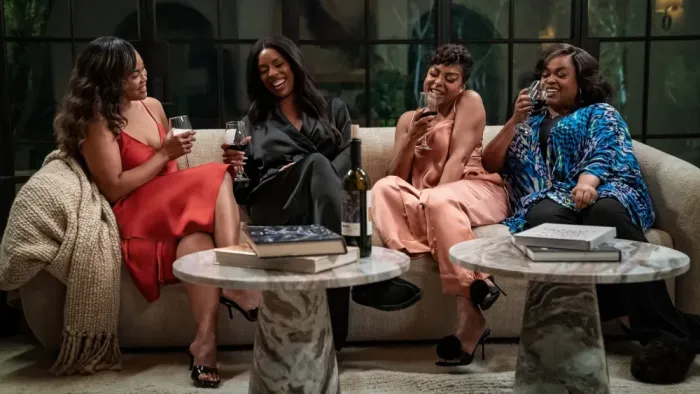 Why Did I Get Married Again?: Female friends on a sofa together.