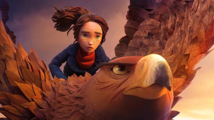 Wildwood film still: Prue rides a large eagle through the sky at sunset