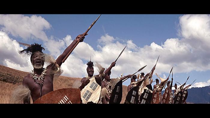 Zulu: A Zulu army point their spears to the sky.