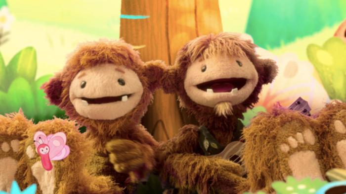 Bigfoot and his father sing together. 