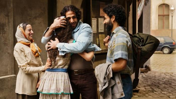 4 Blocks Zero: Ibrahim (center) reunites with his family