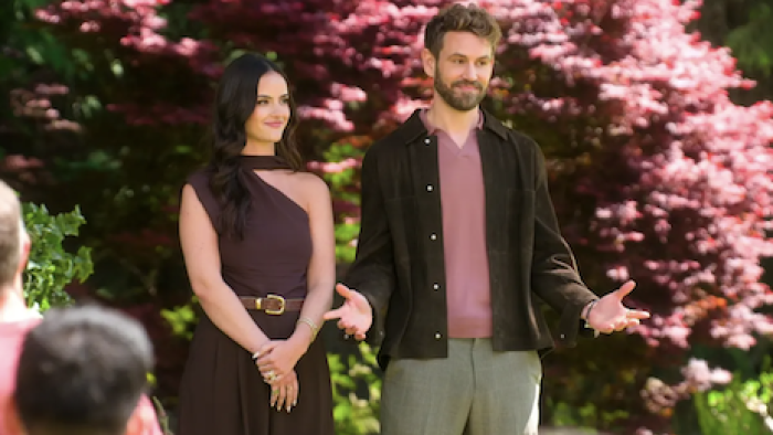 Age of Attraction TV show screenshot 1: Nick Viall and Natalie Joy standing together. 