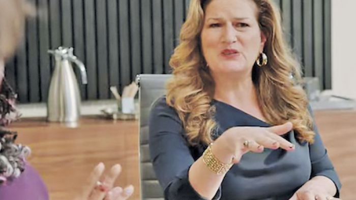 New CEO Katherine Hastings in a meeting. 