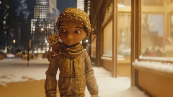An Almost Christmas Story TV: Luna walks down a snowy street at night with Moon, the owl, sitting in her shoulder.