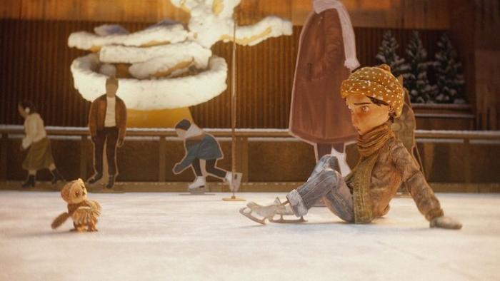 An Almost Christmas Story TV: Little owl Moon and Luna look curiously at each other on the floor of the ice skate ring in Rockefeller Plaza, New York.