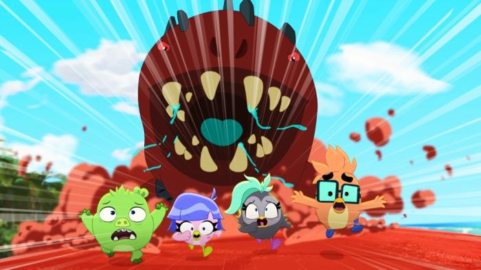 Angry Birds Mystery Island screenshot 3: Hamylton, the piglet, and hatchlings Mia, Rosie and Buddy being chased by a sandworm