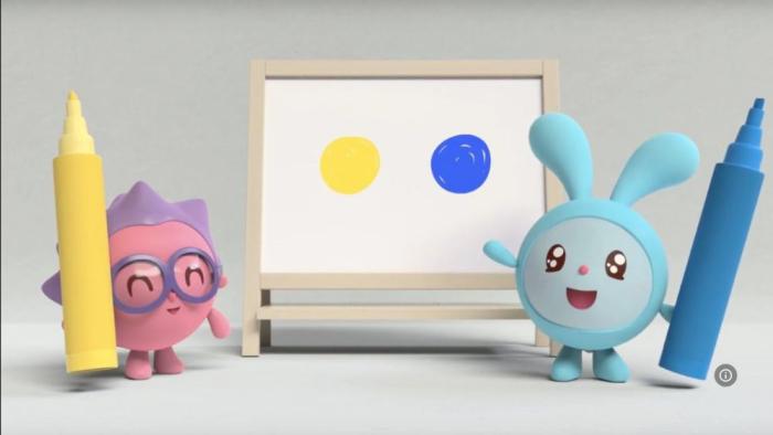 Baby Riki: Two characters with art supplies - purple character with glasses, blue bunny character, easel with paint dots.