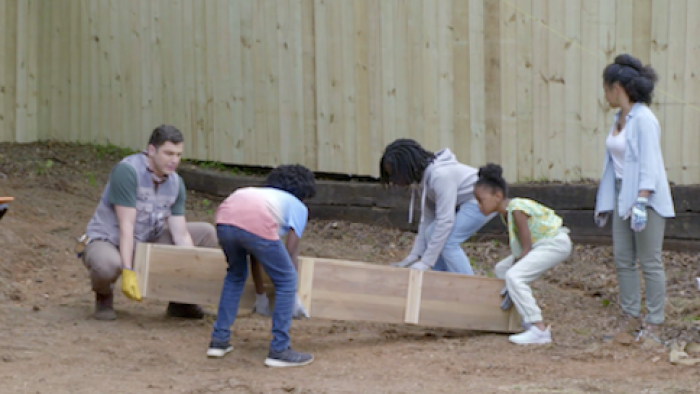 Backyard Blowout TV Show: Working hard to build garden beds. 