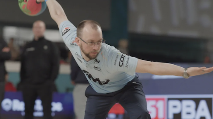 Born to Bowl TV show screenshot 2: E.J. Tackett about to launch colorful ball in left hand. 