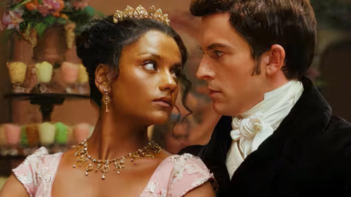 Bridgerton Season 2 TV show screenshot 2: Kate and Anthony are shown in close up, gazing at each other's eyes as they dance together