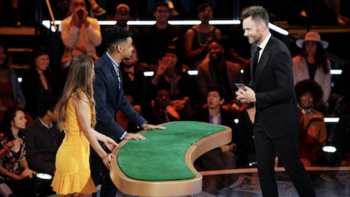 Card Sharks TV Series: Joel McHale and contestant before a game. 