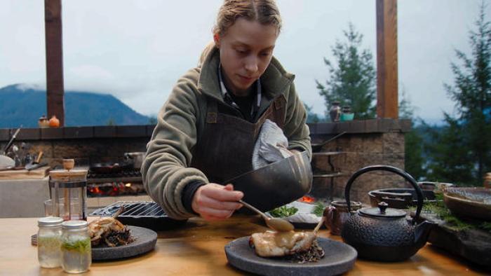 Chefs vs. Wild TV Show: a chef prepares fine dining meal in outdoor kitchen
