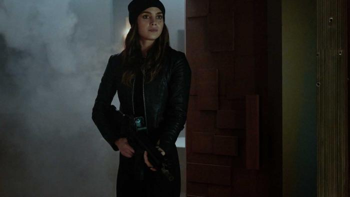 The Copenhagen Test TV show screenshot 3: Michelle stands, armed, in a misty doorway