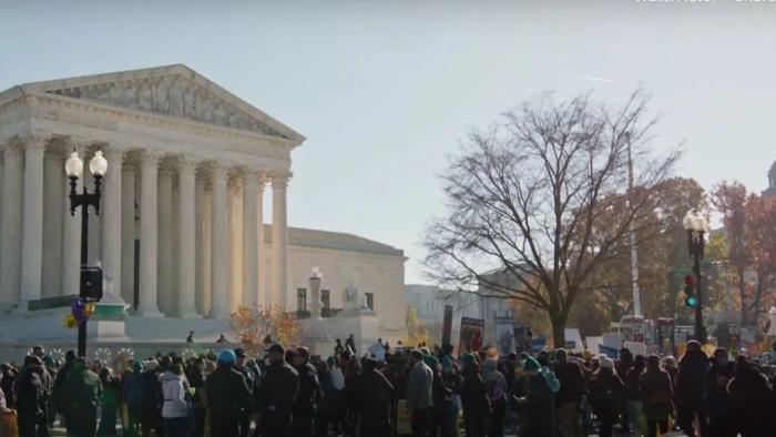 Deadlocked TV show screenshot 2: protesters rally outside the Supreme Court Building