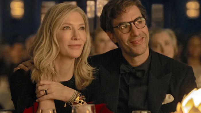 Disclaimer: Catherine and Robert are sitting at a table, bathed in a golden glow; he has his arm around her