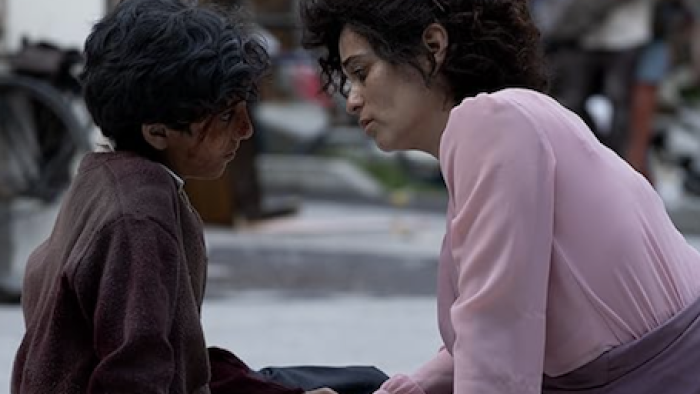 Every Minute Counts TV show screenshot 3: Gabriela sits and comforts her rescued son.
