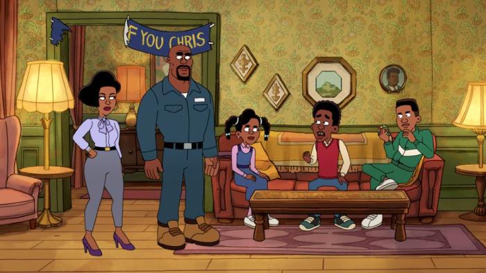 (From Left-Right) Rochelle, Julius, Tonya, Chris, and Drew sit in their family living room. A ripped banner reads” F You Chris.”