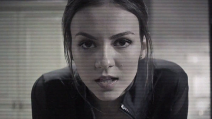 Eye Candy: What looks like a security cam still of a young woman looking at the camera